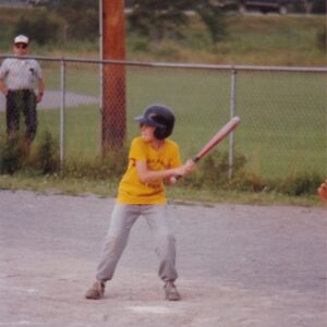 Chris Cameron as a boy playing baseball